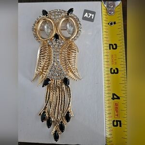 Elegant Gold and Black Owl Brooch